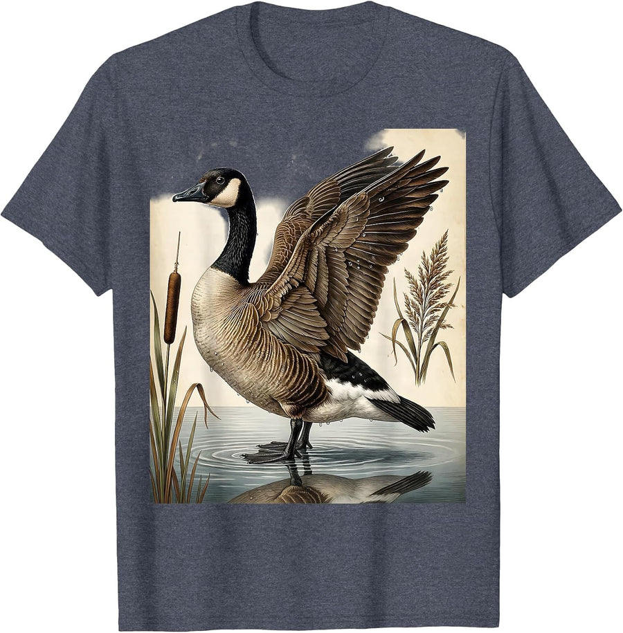Goose Emerging From Misty Lake at Dawn T-Shirt - Heather Blue